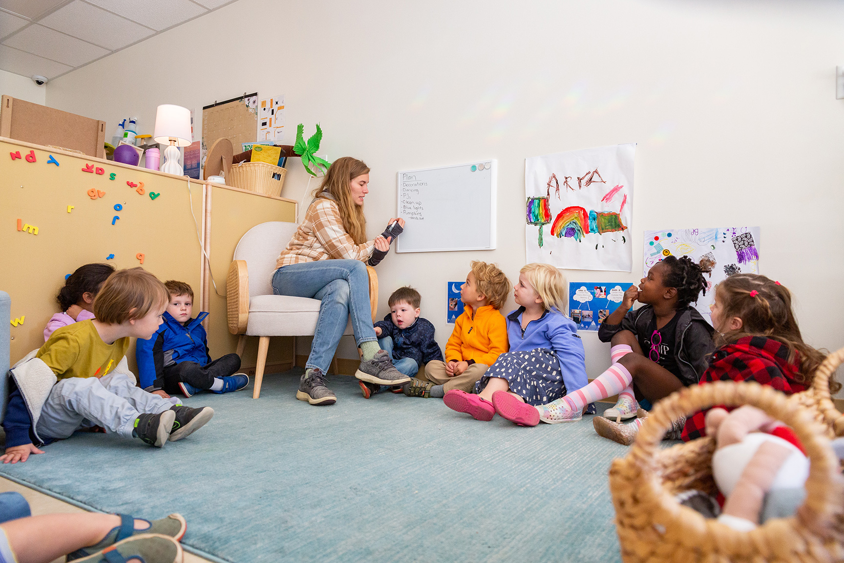 Teacher teaching children at the CDC